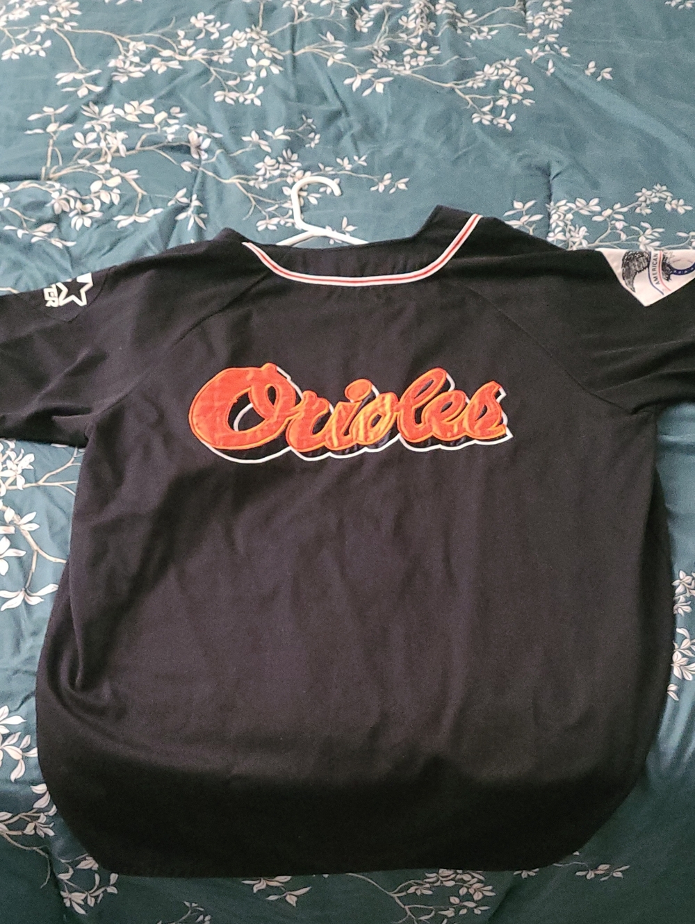 STARTER  1990s Black Orioles Jersey with Orange Script. Heavy Material.
